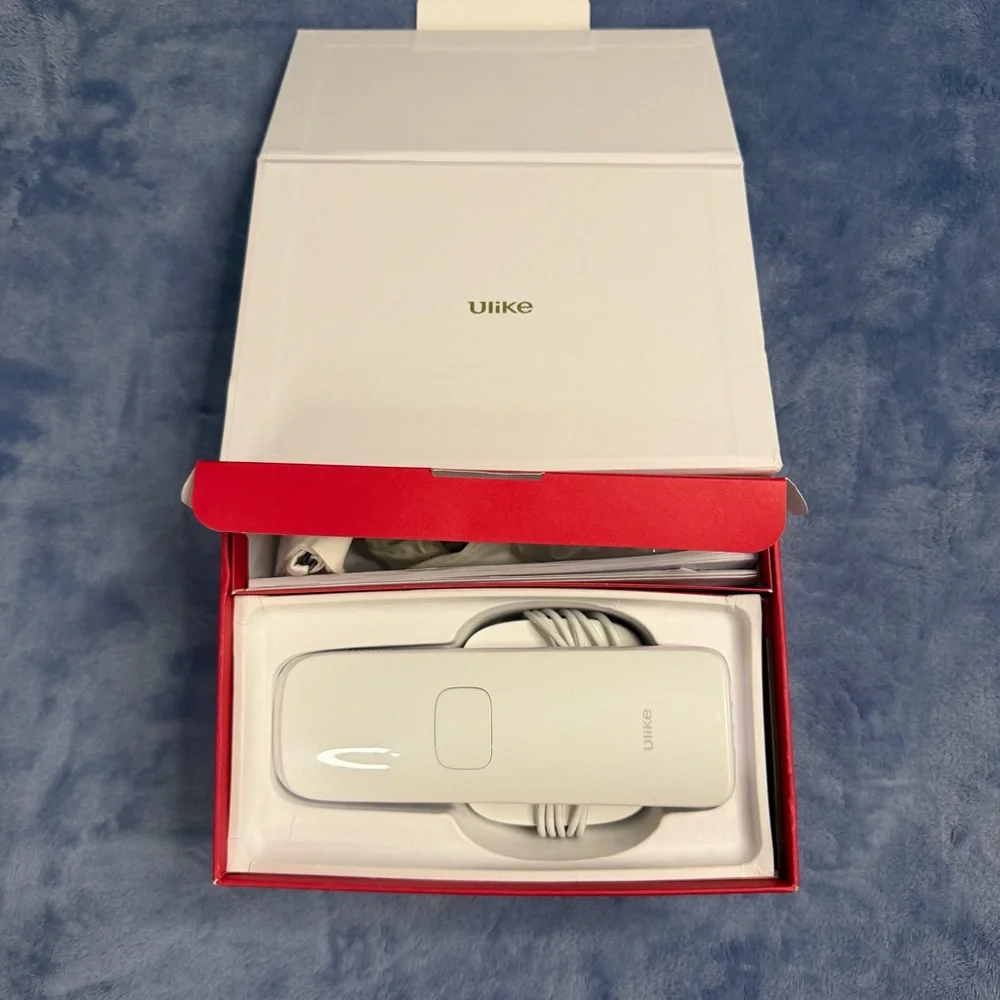Ulike hair removal White Handheld Device in Original Box used 1 time‎